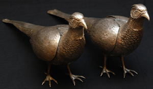 Pair of early 19th century German-made silver pheasant bird vessels (est. $4,000-$6,000). Image courtesy of Elite Decorative Arts.